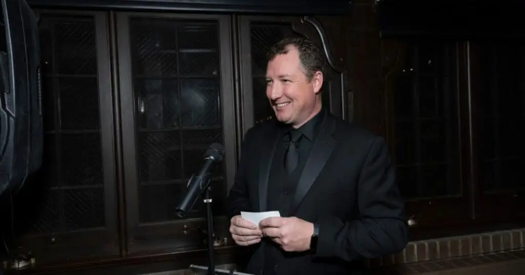Wedding DJ Adam Garrison MCing at a wedding reception
