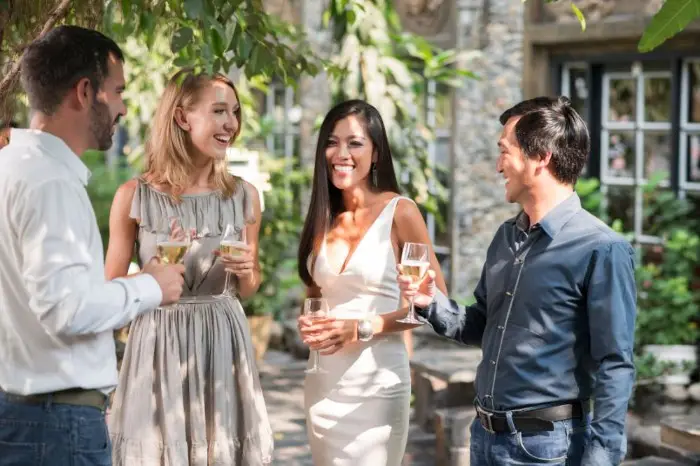 wedding guests enjoying the cocktail hour