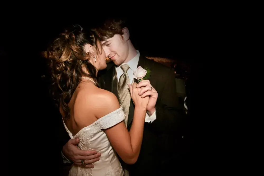 Couple having a private last dance at the end of their wedding.